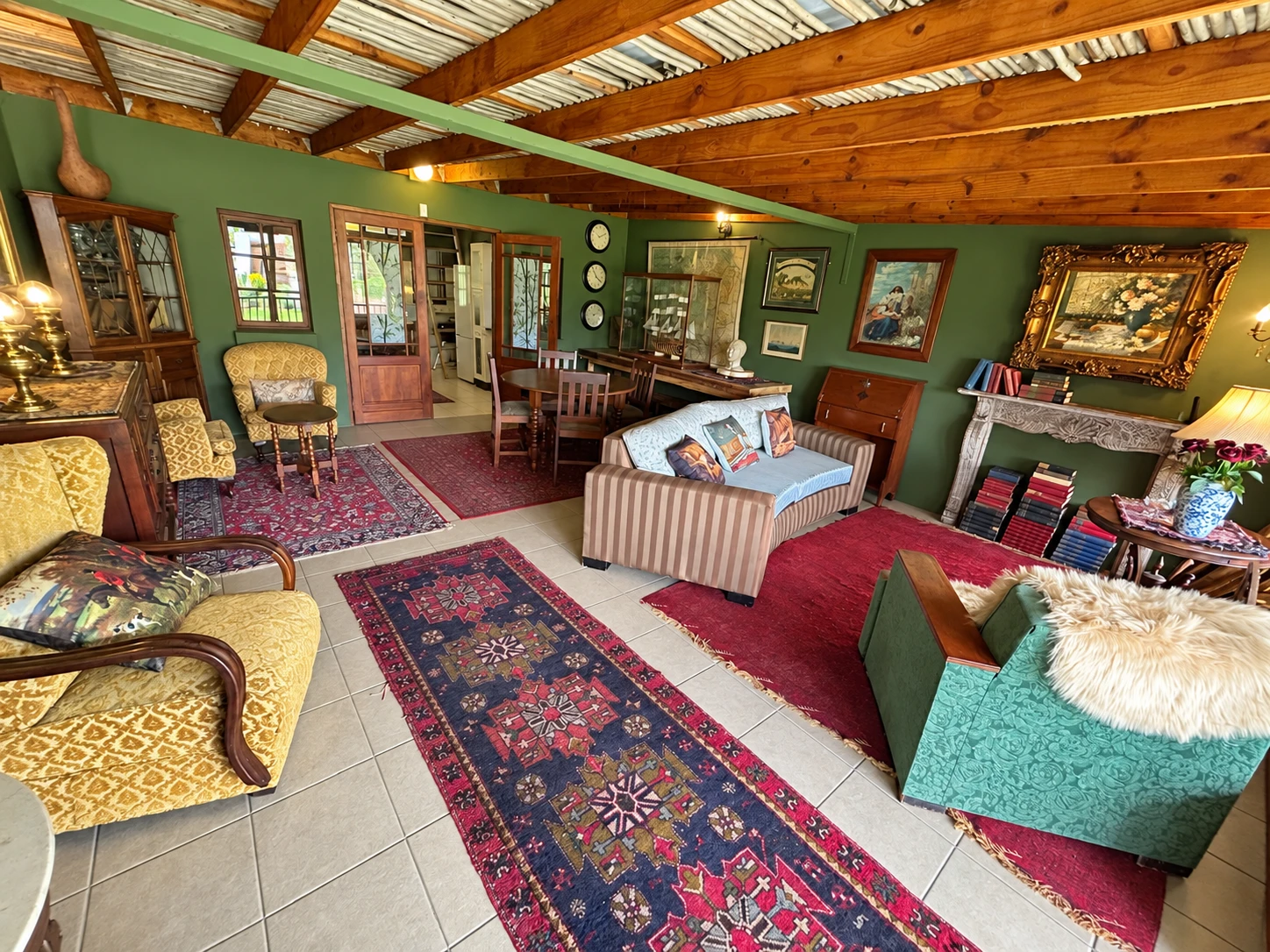 Communal lounge with ample seating, persian carpets and ornate décor