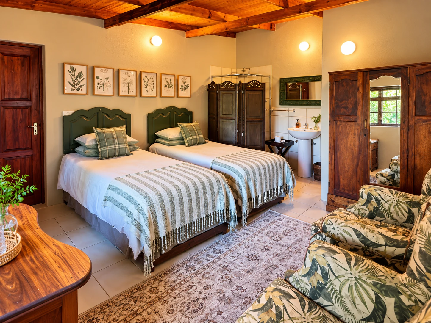 Twin beds with striped linen and botanical patterned seating